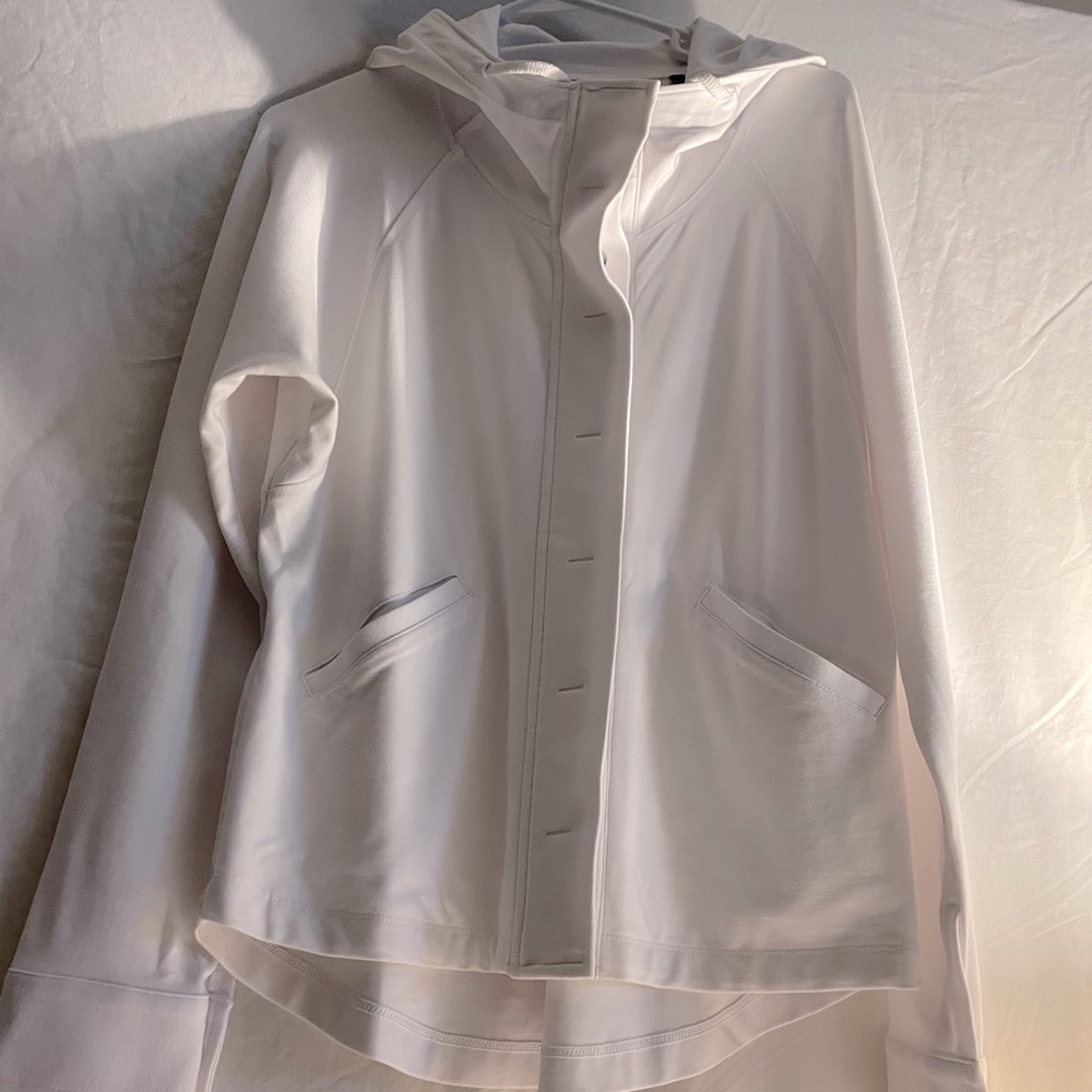 White sport jacket. Color: White